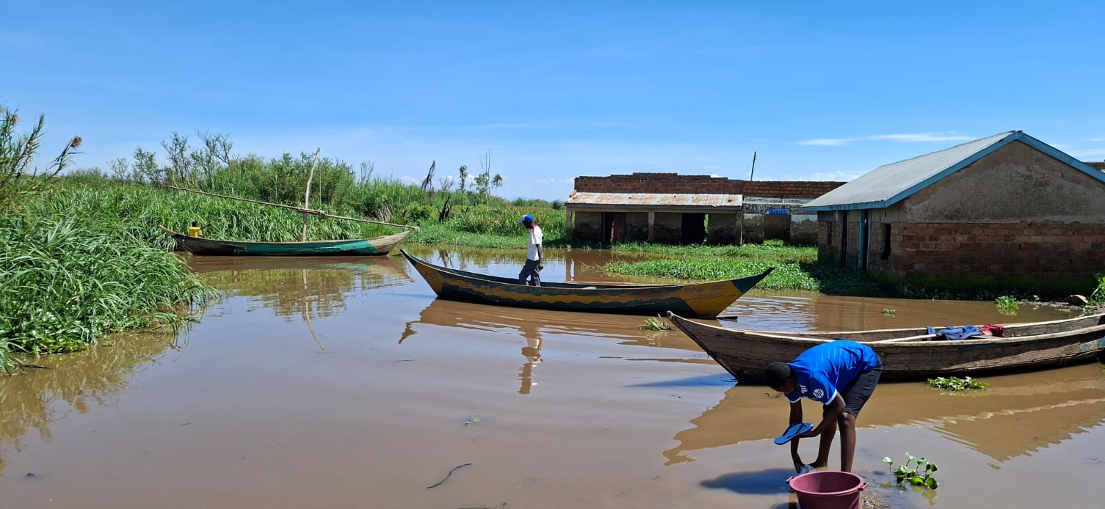 Flooded homes and displaced families in Obaria Beach during the heavy rainy season
